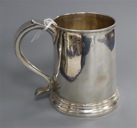 An early George I Britannia standard silver mug, Nathaniel Lock, London, 1715, 9cm.